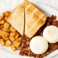 Country Breakfast · Two poached eggs served on corned beef hash.