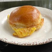 Egg & Cheese · Two eggs scrambled, swiss, or provolone, on brioche, or croissant.