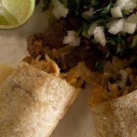 3# Combo · A burrito mexicano and one taco stuffed with rice, beans, and cheese and your choice of meat.