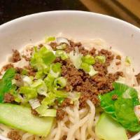 Dan Dan Noodle · thick noodles, minced pork,  pickled vegetable, sesame paste, chili oil