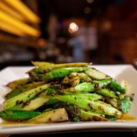 Dried Sautéed Asparagus · asparagus, pickled vegetable, garlic
