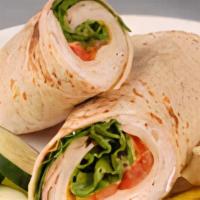 Beef Cheesesteak Wrap · Cheesesteak with lettuce, tomatoes & mayo.