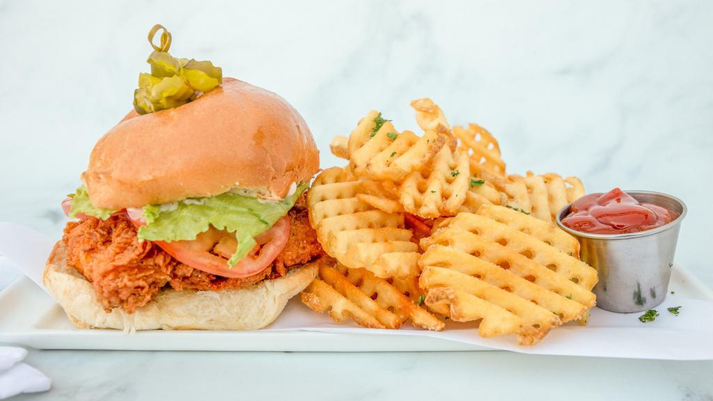 Southern Chick · Hand battered, crispy fried chicken breast on a toasted brioche bun served with lettuce, tomato, onion, mayo and side of waffle fries.