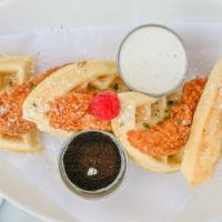 Chicken & Waffles · Sweet and salty crispy country-fried chicken breast tenders and a malted belgian style waffl...