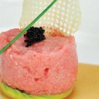 Tuna Tartar · Chopped with Washington onion, caviar and fresh wasabi ponzu sauce.