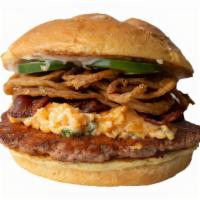 Alaska Turkey Single · Grilled Turkey burger, Kenai Cheese, applewood smoked bacon, haystack onions, jalapenos, and...