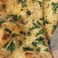 Garlic Naan · Leavened flatbread with garlic. Vegetarian.