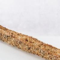 Swiss Cheese Baguette · Our baguettes are available in plain, poppy, swiss cheese, or sesame seed. All are handmade ...