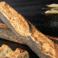 Poppy Seed Baguette · A variation of our ‘signature’ baguette, liberally sprinkled with poppy seeds. The dough is ...