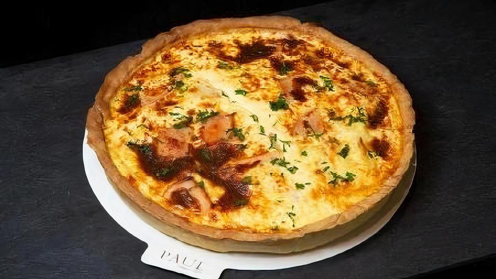 Large Quiche Lorraine (Serves  8) · Paris ham, bacon, swiss cheese, and eggs in a puff pastry shell. Serves 8.