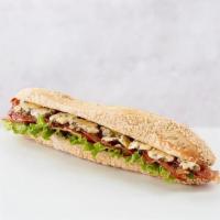 Chicken, Bacon & Stilton Sandwich · Chicken, bacon, lettuce, tomato & dijonaise spread on a sesame seed baguette.