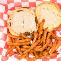 Salmon Burger · Served on a brioche bun with a house sauce and  served with sweet potato fries