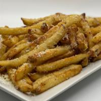 Truffle Fries · Thin cut fries tossed in delicious white truffle oil and seasoned to perfection with garlic ...