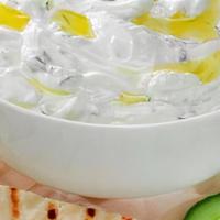 Tzatziki Sauce  · Cool yogurt and cucumbers combine in this traditional Greek sauce, served with carrots , cuc...
