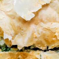 Spinach Pie ~ Spanikopita · A classic blend of fresh chopped spinach & feta cheese wrapped in flaky layers of phyllo dou...