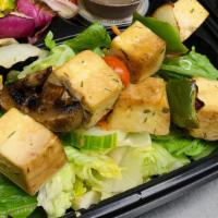 Tofu Skewer Box  · Two tofu skewers with fresh mushrooms, onions, peppers, and tomatoes served with your choice...