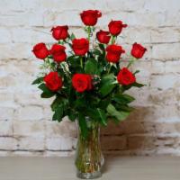 Classic Romance · A classically gorgeous arrangement of a dozen red Roses. For a personal message please write...