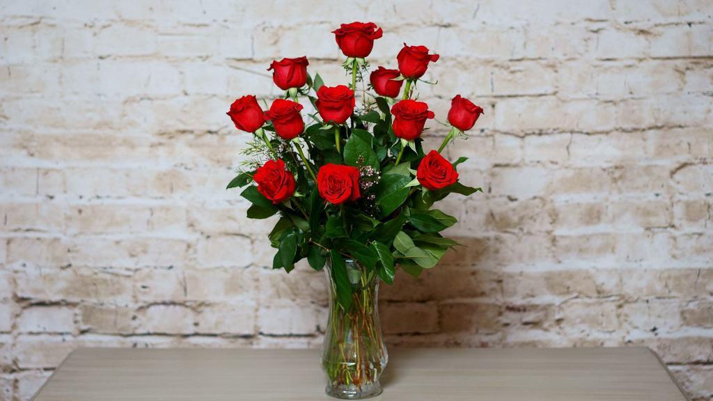 Classic Romance · A classically gorgeous arrangement of a dozen red Roses. For a personal message please write in special instructions.