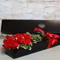Cary Grant Special · In the classic Cary Grant style, A dozen roses in a classic black rose box.  For a personal ...