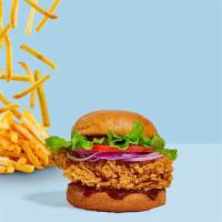 Piqued Bbq Fried Chicken Sandwich · Crispy fried chicken, swiss cheese, avocado, caramelized onions, tomatoes, and barbecue sauc...