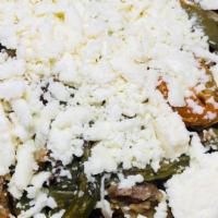 Cactus Fries · carnitas, sauteed jalapeño, queso fresco & side salsa