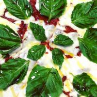 Margherita Pizza · tomato sauce, fresh mozzarella, fresh basil & olive oil
