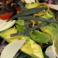 La Güera Salad · spring mix, queso fresco, red onion, corn, sliced avocado, black beans, cherry tomato & tort...