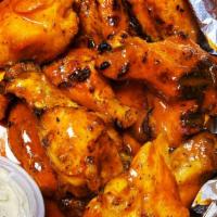Wonder Wings · fried or grilled jumbo party wings with your choice of sauce. served with celery & blue chee...