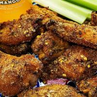 Mexican Dry Rub Wings · Traditional Mexican herbs and spices tossed in our jumbo party wings, served with celery and...