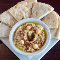 Hummus W/Bread · Mashed chickpeas blended with tazihiki sauce, served with pita