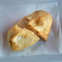 Samosa (2) · Savory triangular pastry with a regetable filling or beef filling.