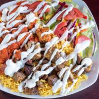 Gyro Platter · Topped off with tsatsiki sauce and includes wide salad.