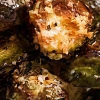 Fried Brussel Sprouts · Brussel sprouts tossed in a balsamic honey glaze with bacon lardon.