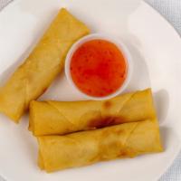 Vegetarian Spring Rolls · Deep fried veggie spring rolls (3pc). Served with mouthwatering sweet sauce on side.