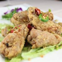 Chicken With Garlic Sauce · Served with a choice of egg roll, vegetable spring roll, crab rangoon, or chicken wings. Cho...