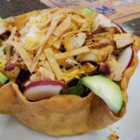 Avocado Taco Salad · Served in a homemade flour tortilla bowl with your choice of chicken or beef, mix lettuce, c...