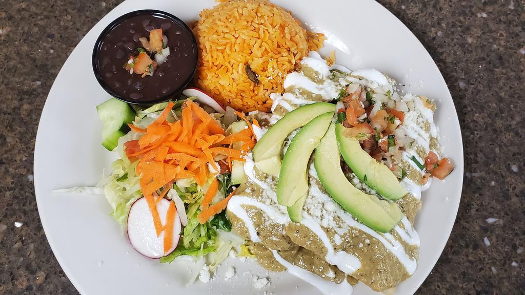 Avocado House Enchiladas · Corn tortilla stuffed with cheese and your choice of crab meat or shrimp. Wet with mexican cream sauce and topped with mexican sour cream, pico de gallo, queso fresco and avocado slices.
