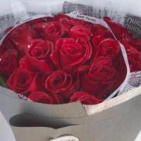 Two Dozen Red Rose Bouquet · The handtied bouquet includes two dozen premium long stem red roses.