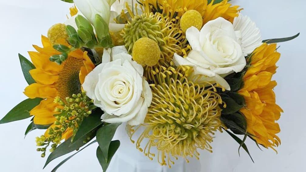 You Are My Sunshine · It's a very bright color arrangement, with yellow and white mixed flowers. Due to the availability, the vase may be different from the picture.