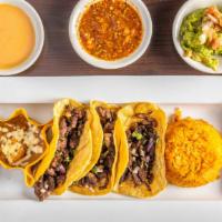 Tacos: Asada · Grilled steak, onion, and cilantro.