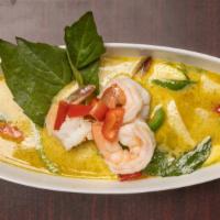 Green Curry · Medium spice. A sweet and spicy curry with young green Thai chili, shallots, kaffir lime lea...