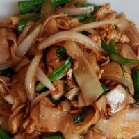 Pad Sa Ew · Stir fry wide rice noodle, egg, onions, string beans and Chinese broccoli in thin sweet soy ...