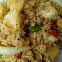 Pineapple Fried Rice · Jasmine rice, egg onion, peas, carrot and pineapple in turmeric soy served with cucumber and...