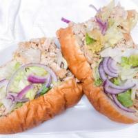 Chicken Cheesesteak Sandwich · Served with French fries, coleslaw and pickle.