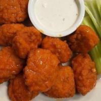 Buffalo Chicken Tenders (5) · 5 chicken tenders tossed in buffalo sauce served with your choice of dressing