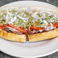 Cheesesteak Hoagie (7 Inch - Half) · Cheesesteak with lettuce, tomato and raw onions