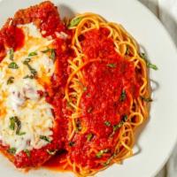 Parmigiana (Chicken) · Lightly breaded and fried covered with our famous homemade tomato sauce and Mozzarella chees...