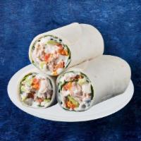 Veggie Hummus Wrap · Fresh cooked chickpeas blended with middle eastern spices, lemon juice and olive oil, rolled...