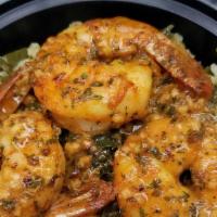 Roasted Garlic Shrimp · Served over seasoned rice and collard/kale blend.