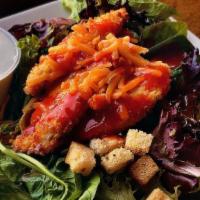 Chicken Tender Salad · Cheddar, veggies, and croutons with honey mustard.